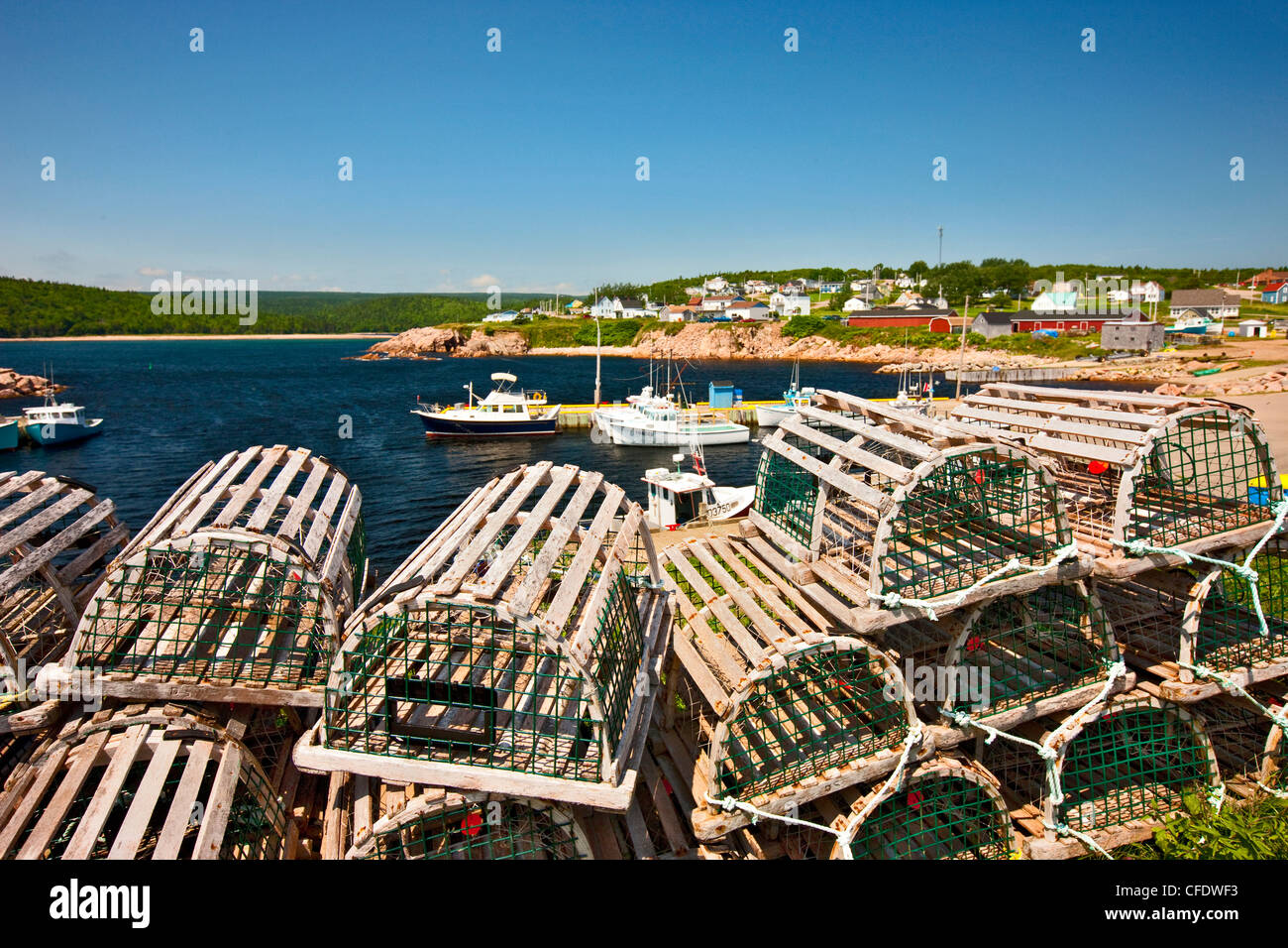 Fishing boats tied up at Neil's Harbour, Cape Breton Highlands, Nova Scotia, Canada Stock Photo