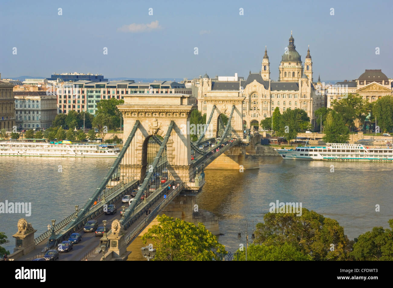 Traffic driving over the River Danube, on The Chain Bridge (Szechenyi Lanchid), Budapest, Hungary Stock Photo