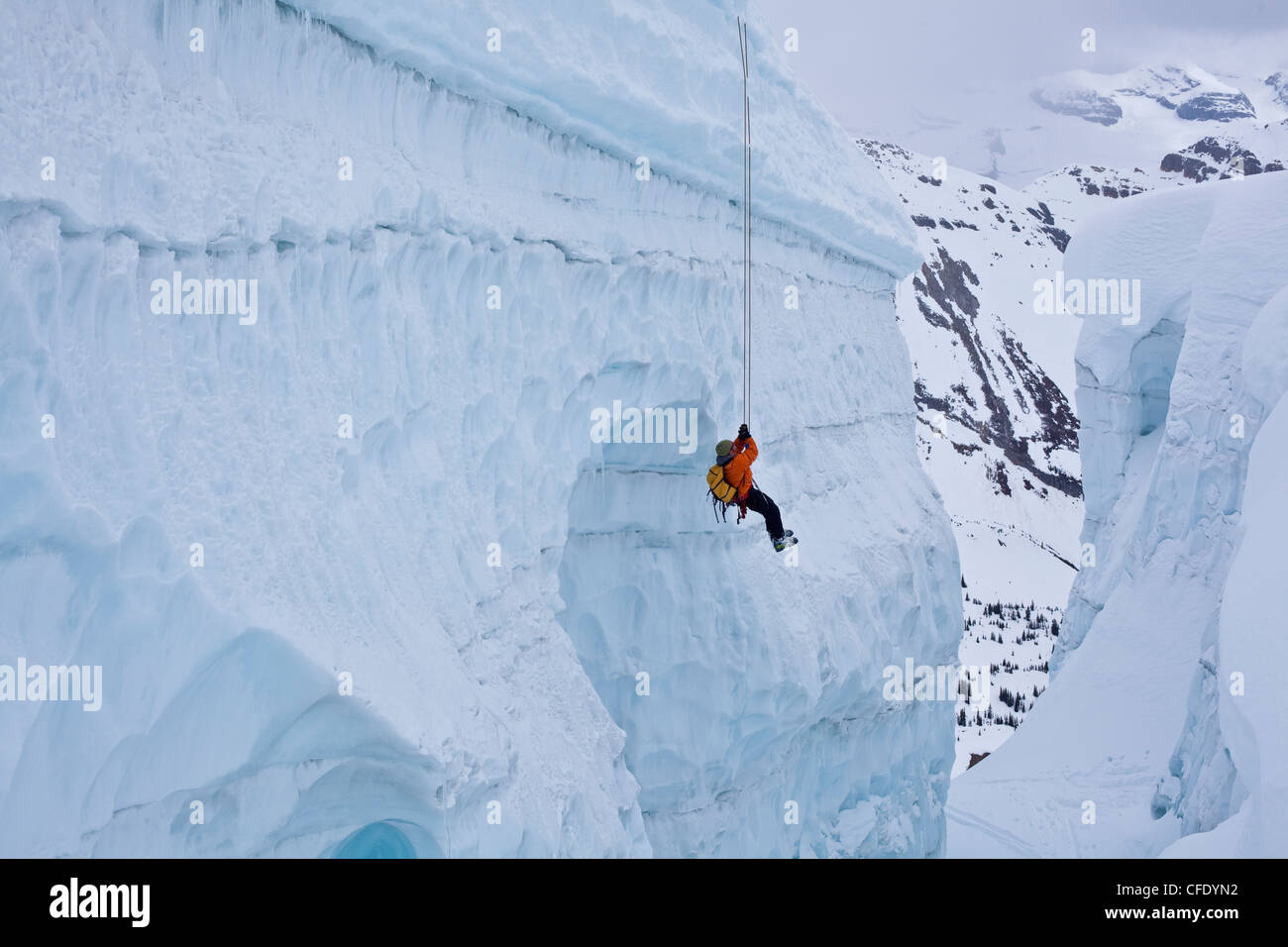 A man practicing crevasse rescue skills while on a ski mountaineering