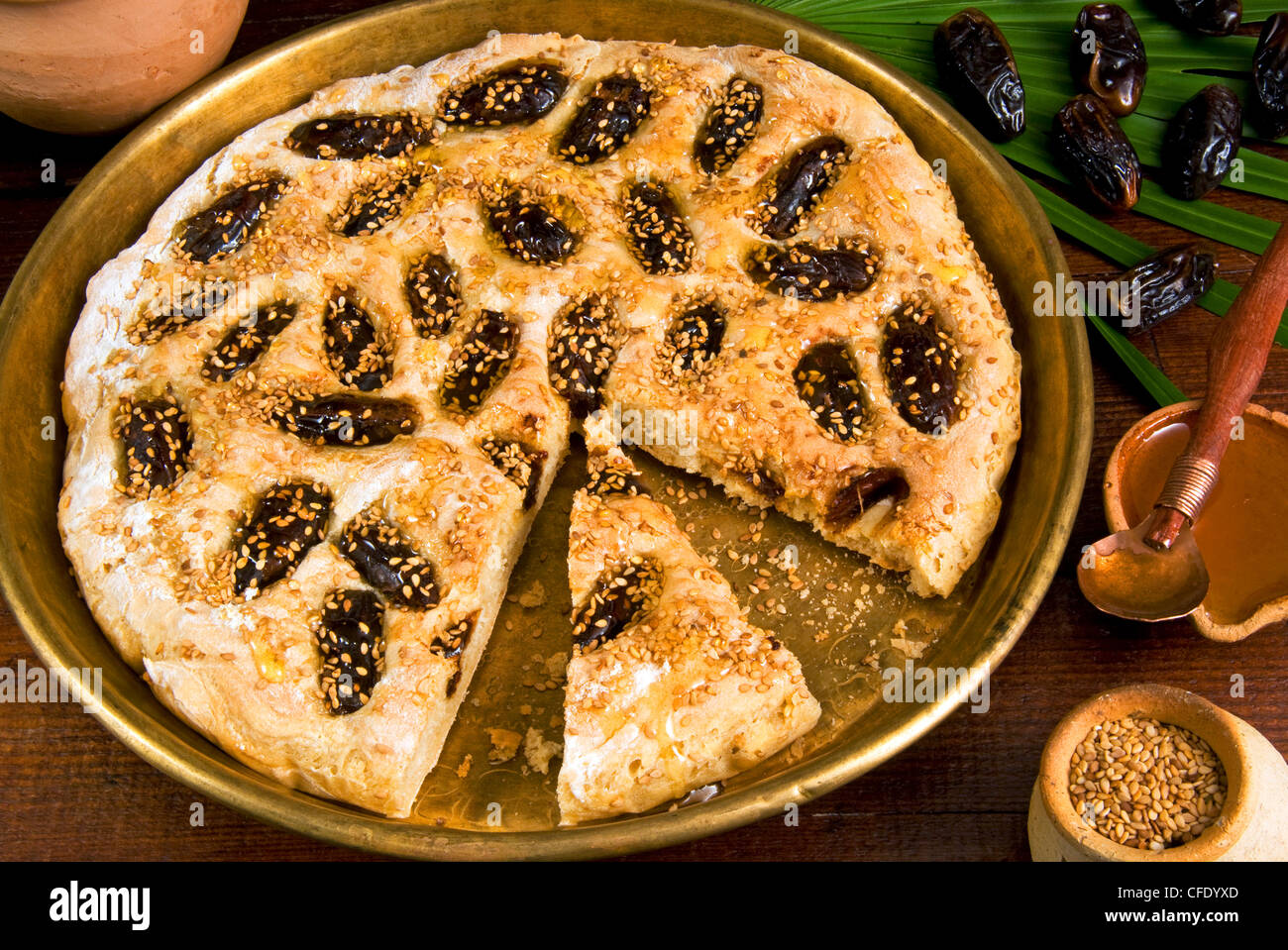 Ancient Babylonian pastry, sweet bread with honey, dates, sesame, Al