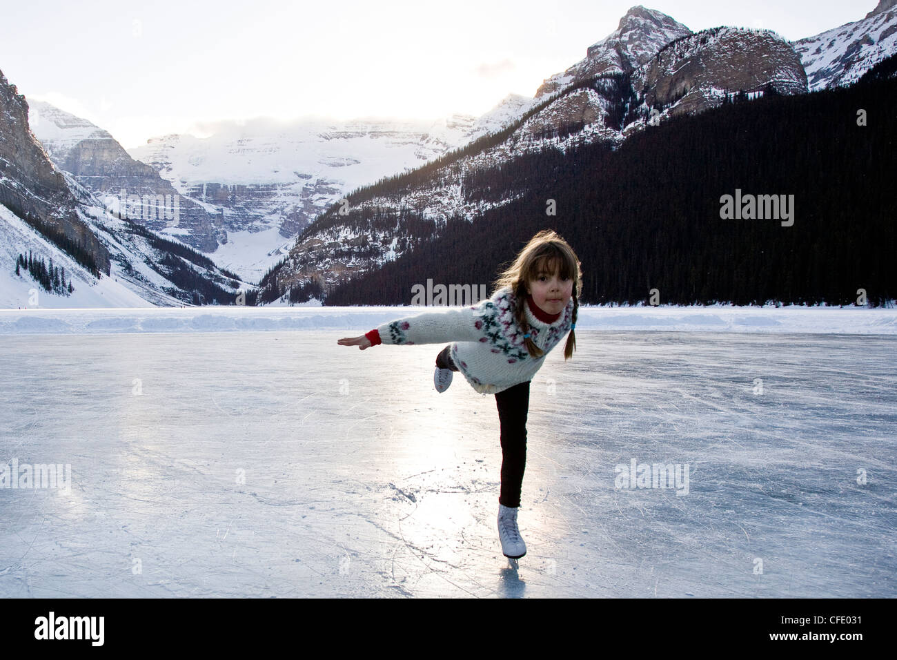 Girl ice skating lake hi-res stock photography and images - Alamy