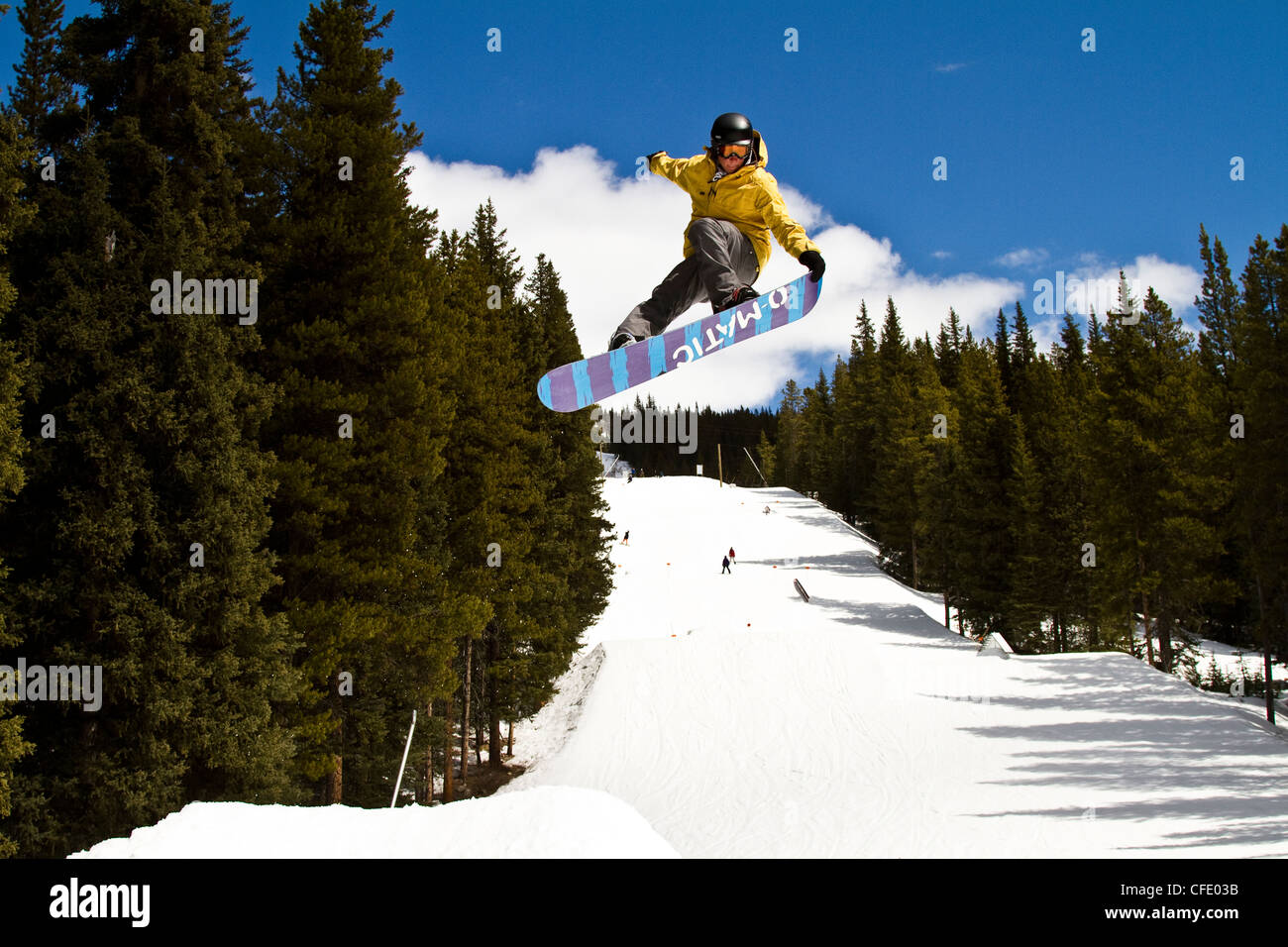Young man snowboarding at Lake Louise Resort, Banff National Park