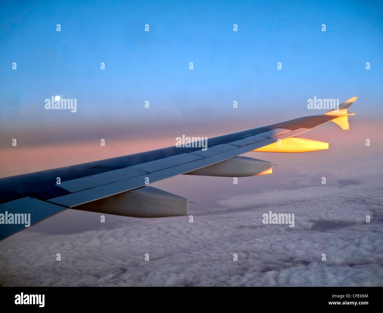 View from a window of an Airbus 320 Commercial Airliner Wing over Greenland Stock Photo