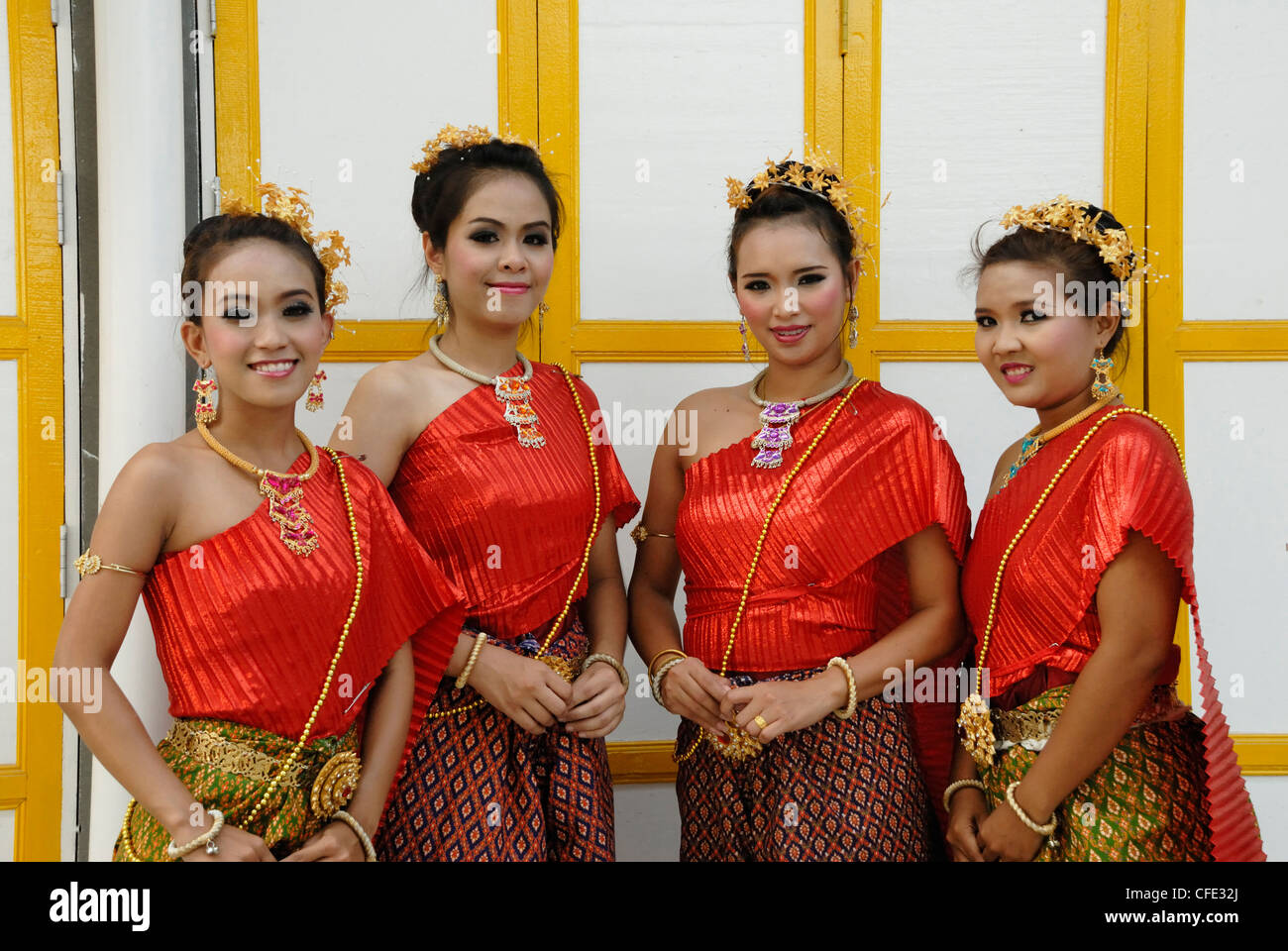 Four young ladies in traditional Thai costume in Bangkok on 4/02/2012 Stock Photo