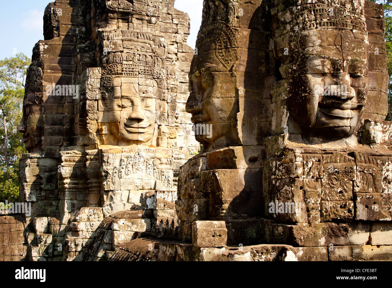 The smiling faces atop the Bayon Temple in Ankor Cambodia Stock Photo
