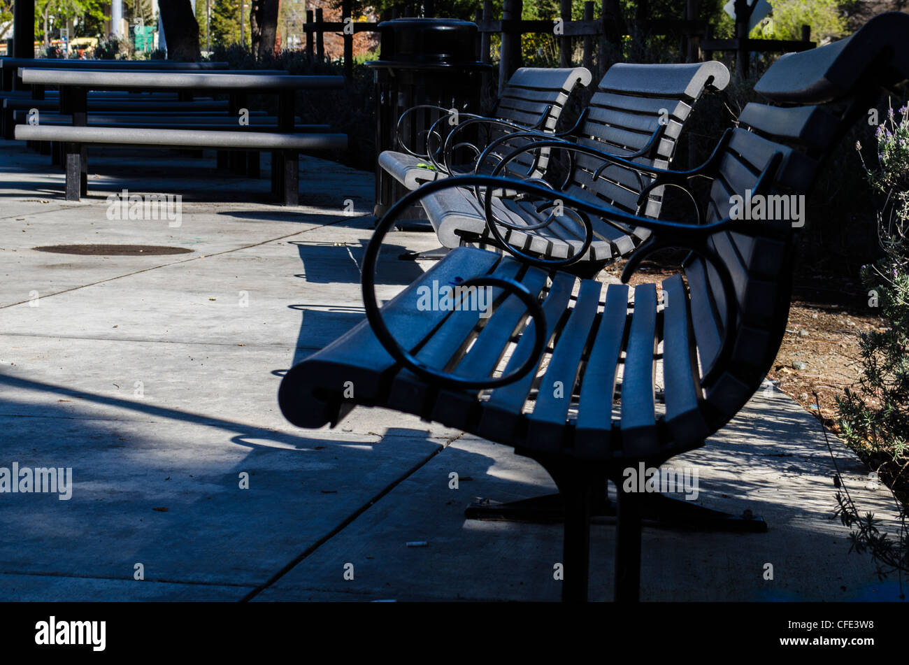 Benches and picnic tables along Iron Horse Trail in Walnut Creek California. Stock Photo