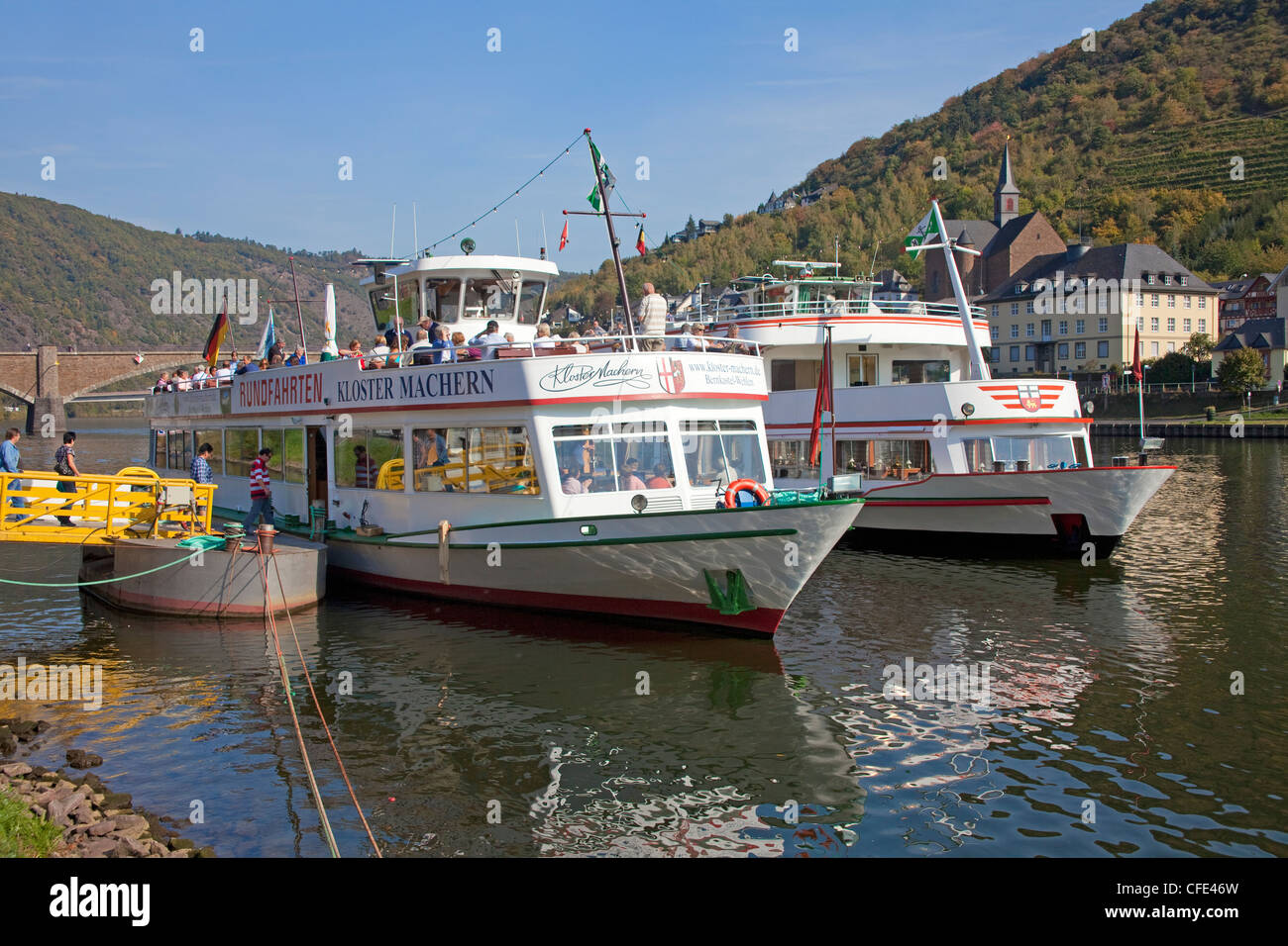Moselle excursion ships at landing stage, sightseeing tours on Moselle river, Cochem, Rhineland-Palatinate, Germany, Europe Stock Photo