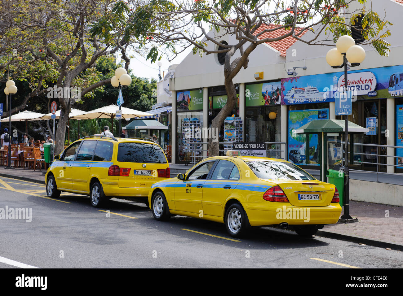 Distinctive yellow taxis Funchal Madeira Portugal Stock Photo