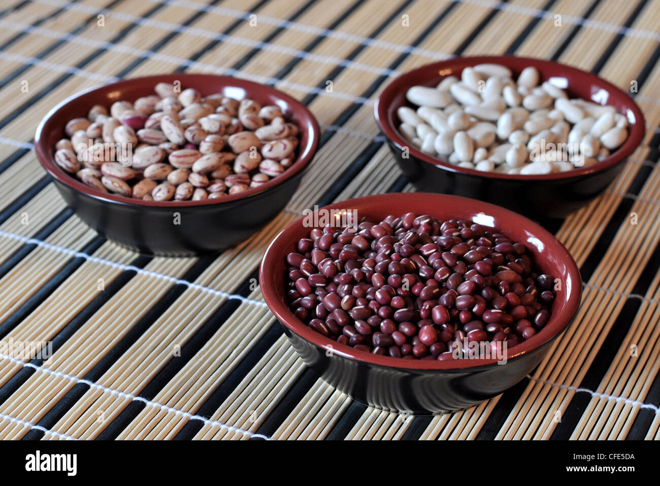 Three bowl with different kinds of beans Stock Photo
