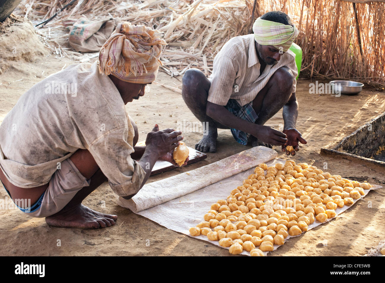 Jaggery production in the rural south Indian countryside. Rolling Raw