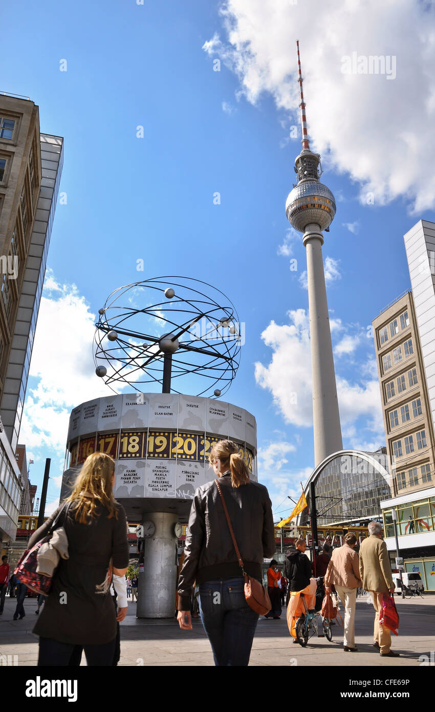 Two Berlin landmarks, the World Time Clock and TV Tower, shot from Alexanderplatz on a blue-sky summer's day. Stock Photo