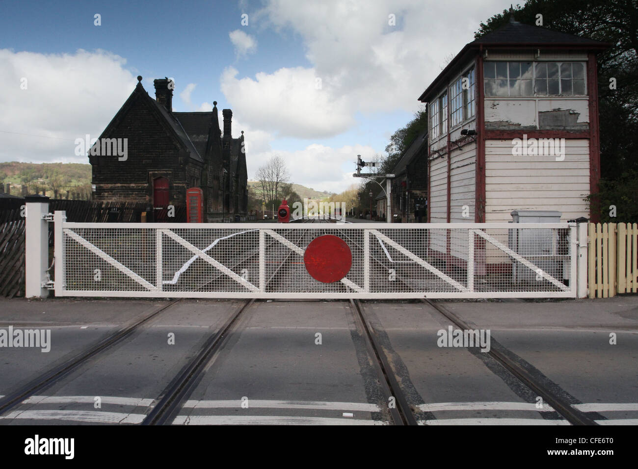 Manual gates across a level crossing at a the Darley Dale station on