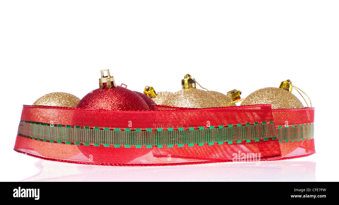 christmas balls with big ribbon around isolated on white background ...