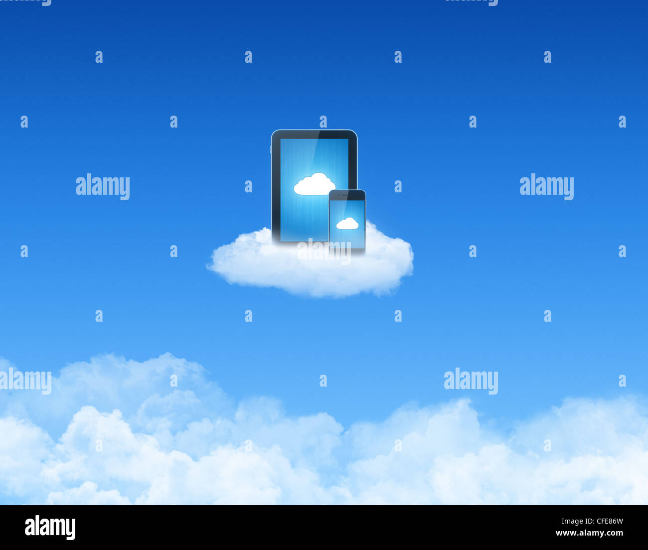 Modern tablet pc with mobile smart phone on a cloud. Conceptual image on cloud computing theme. Stock Photo