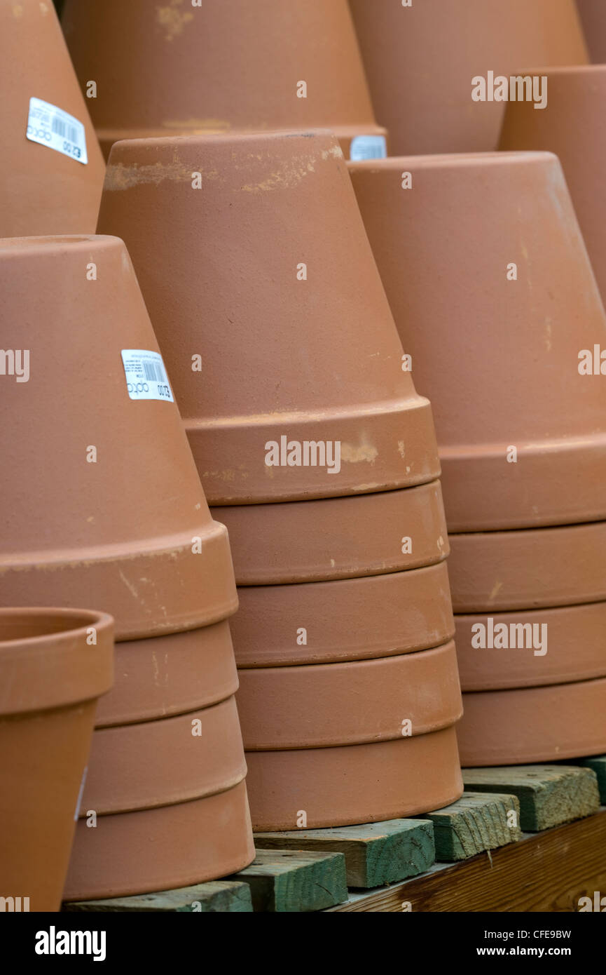 terracotta plant pots on sale stacked Stock Photo Alamy