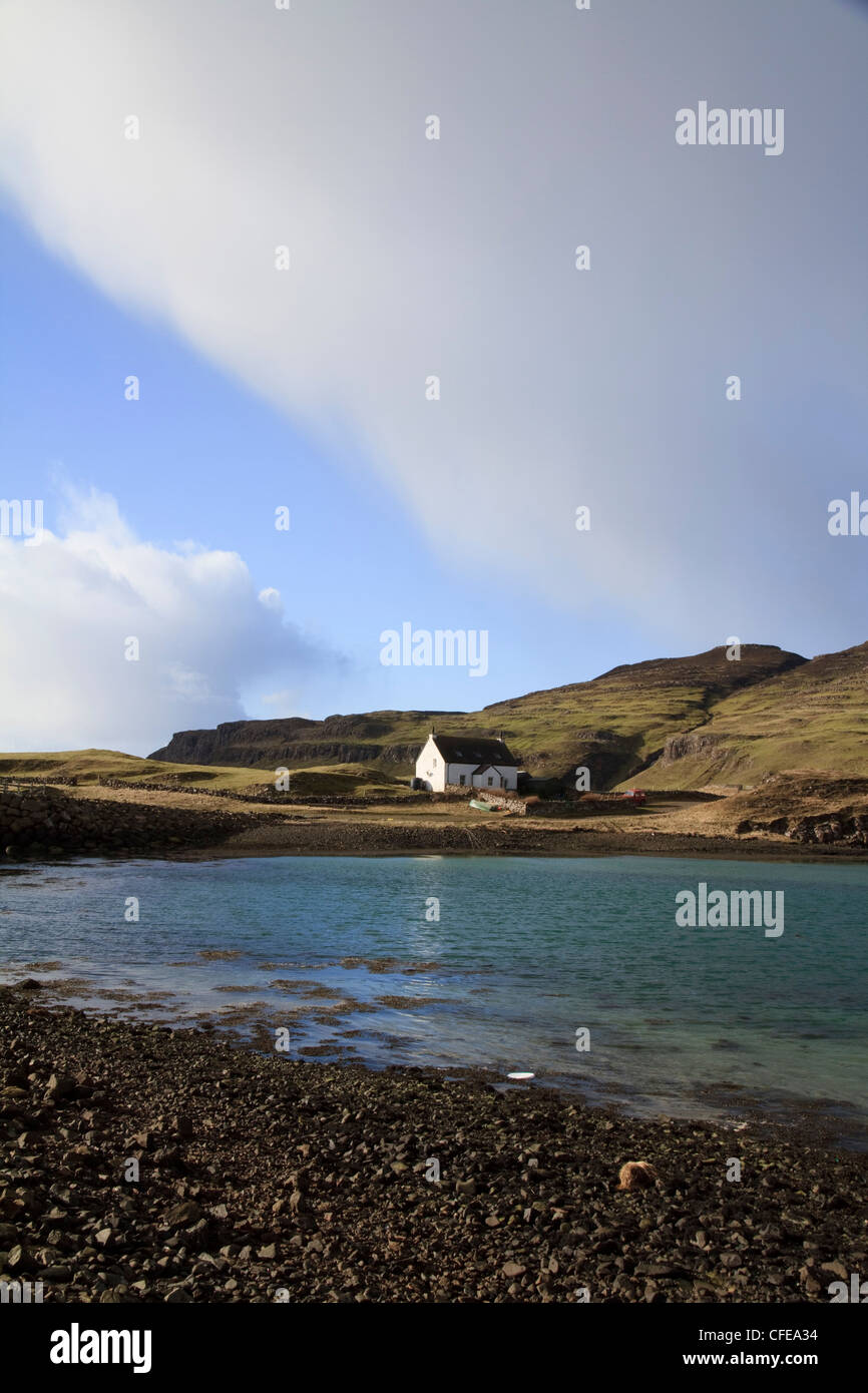 Looking across the bay from the island of Sanday to the main island of Canna, the Small Isles, Scotland Stock Photo