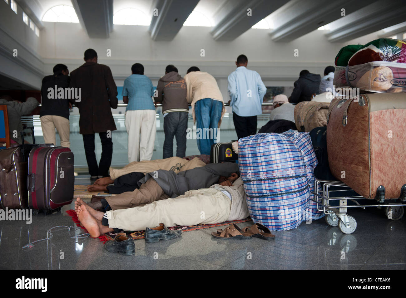 Djerba Airport. Tunisia.  Around 15000  refugees evacuated from Libya waiting for planes to take them back home, 2011 Stock Photo