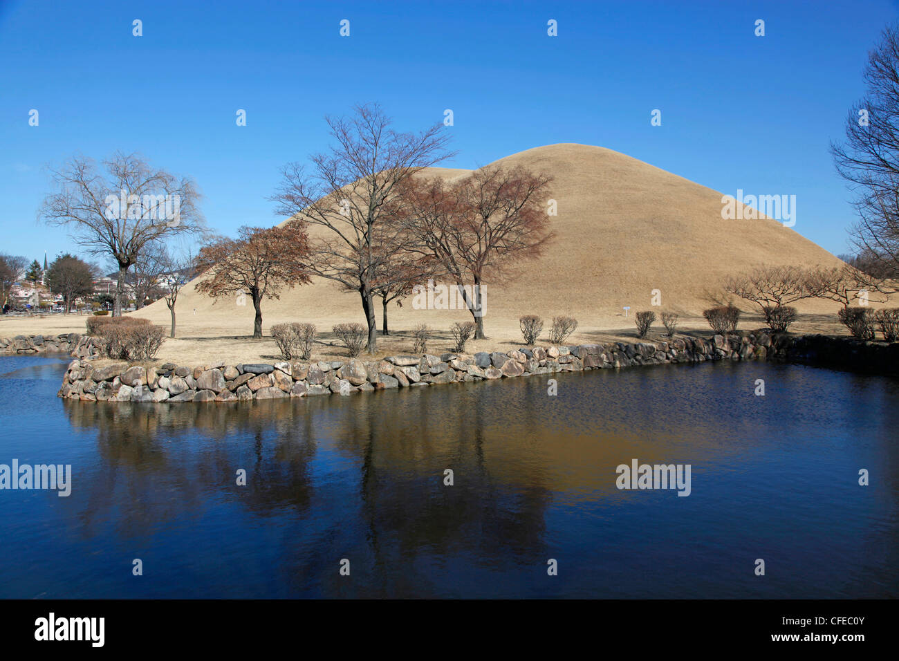 Daerungwon Royal burial mound tombs and tumuli with silhouette of
