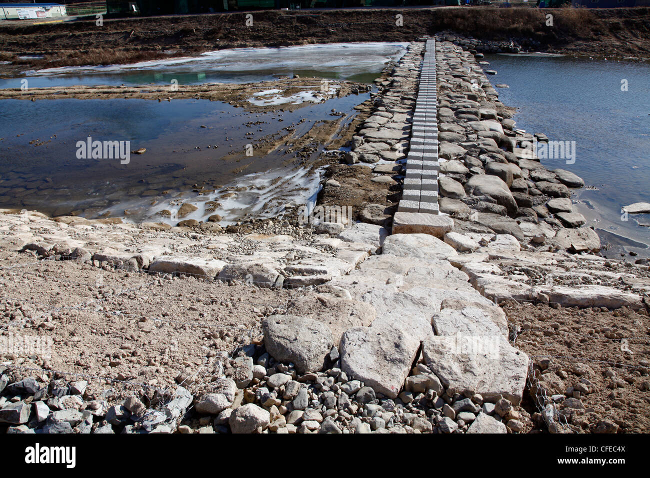 Stepping stones across a river dam in Gyeongju, South Korea Stock Photo