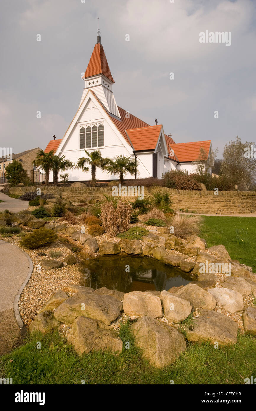 St James’s Church (unique pretty little white timber building with short tower) & attractive Biblical garden - Baildon, West Yorkshire, England, UK. Stock Photo