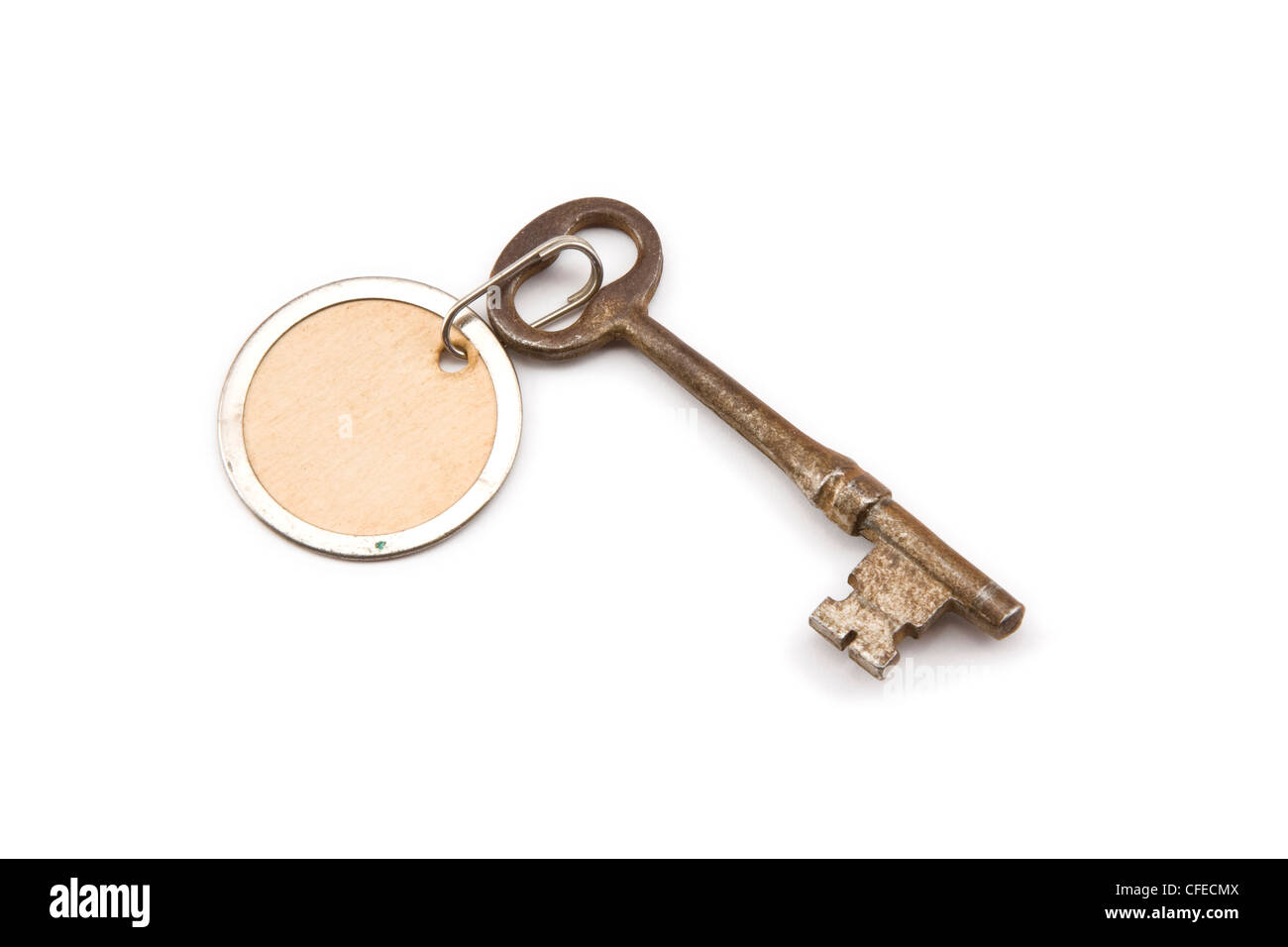 Old skeleton key with blank label attached Stock Photo Alamy
