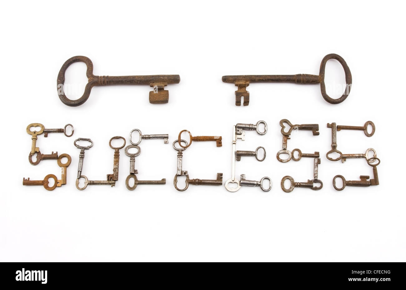 Old skeleton keys spelling out the word success Stock Photo Alamy