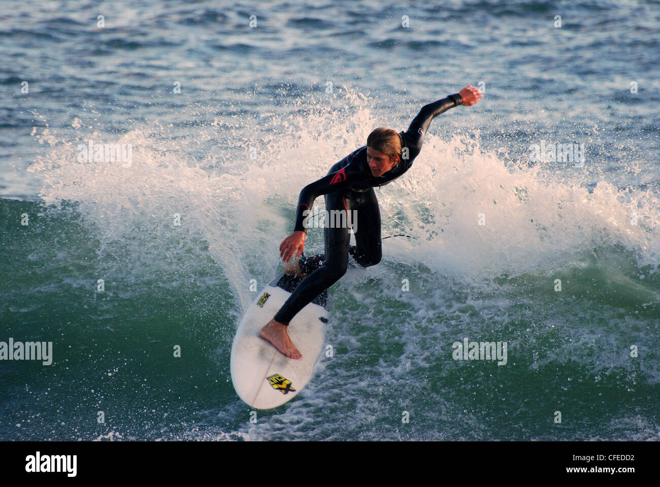 Surfer surfing in Estoril Cascais Portugal Stock Photo Alamy