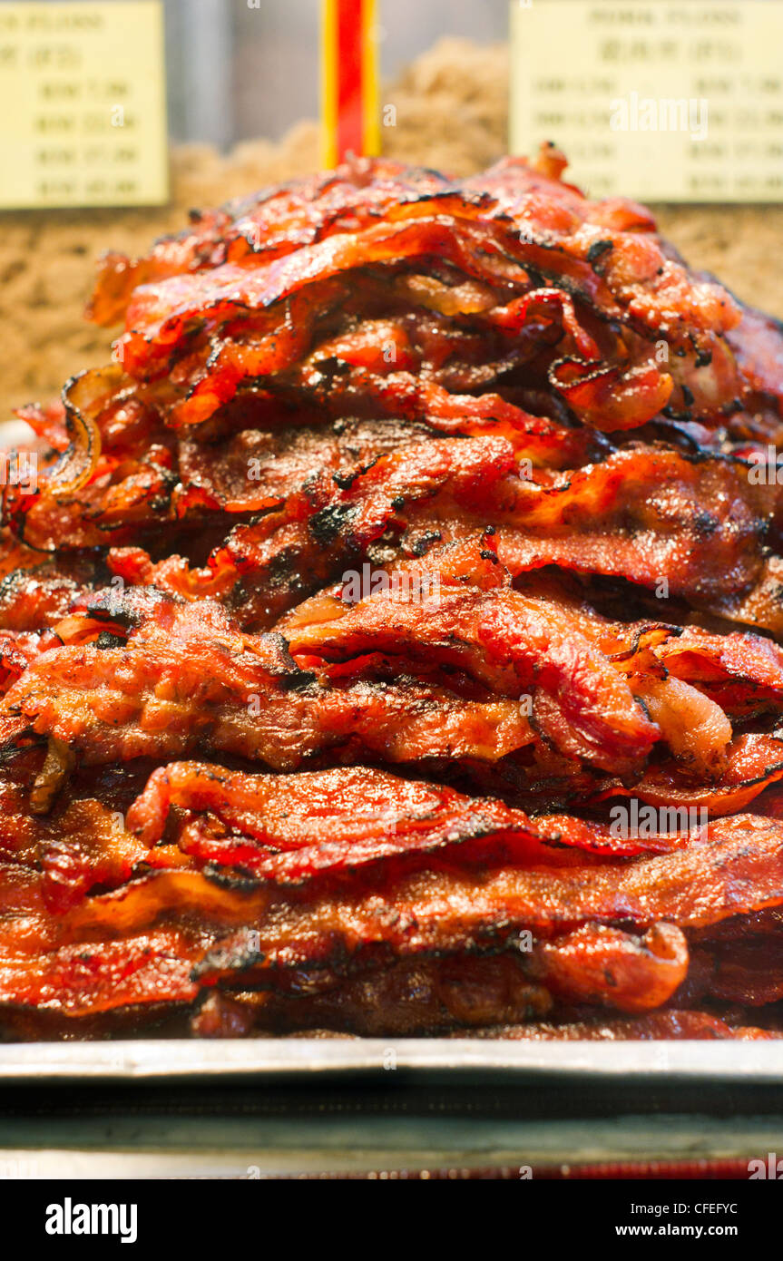 Bakkwa, is a Chinese salty-sweet dried meat product similar to jerky, photo is taken at Chinatown of Kuala Lumpur. Stock Photo