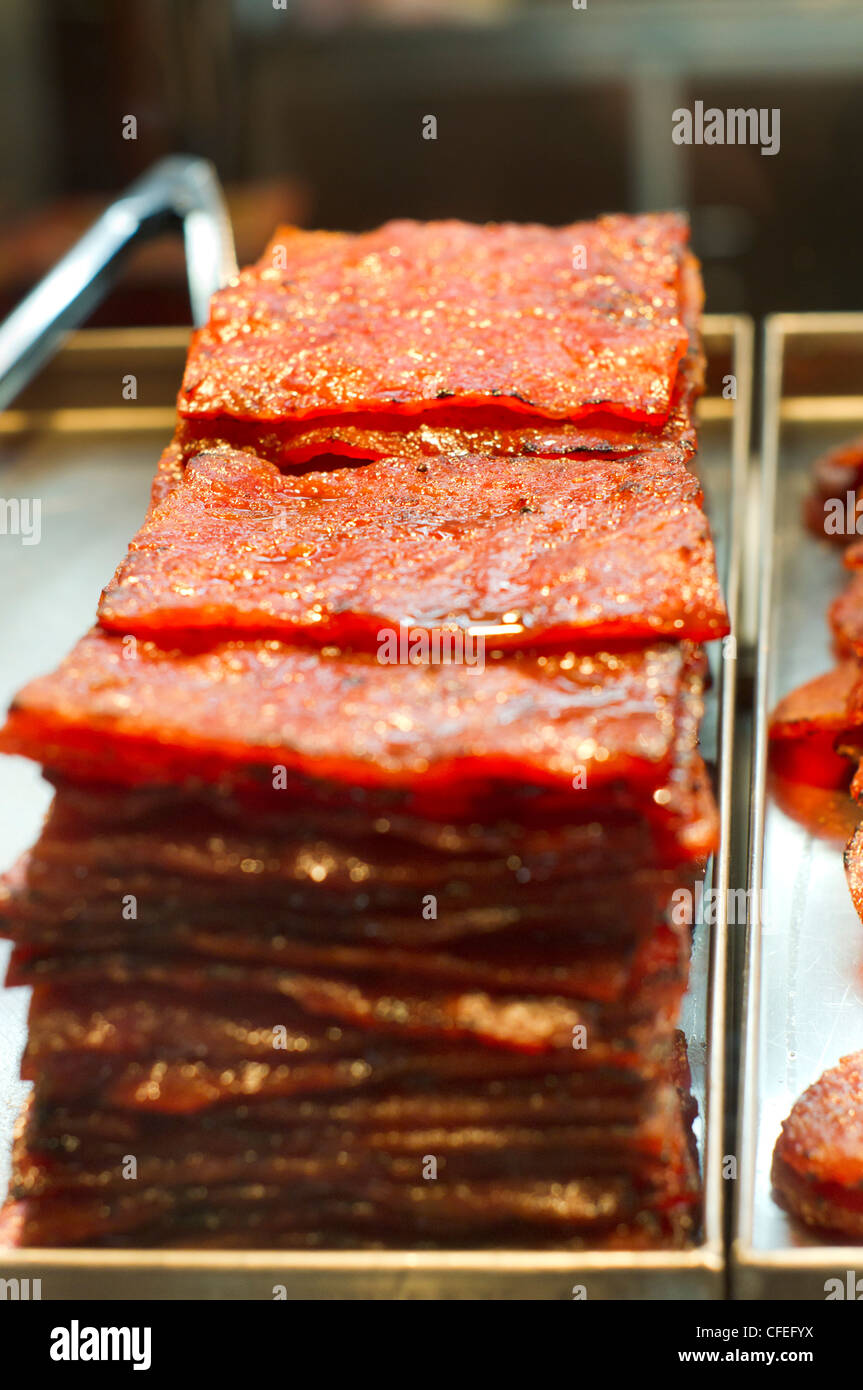 Bakkwa, is a Chinese salty-sweet dried meat product similar to jerky, photo is taken at Chinatown of Kuala Lumpur. Stock Photo