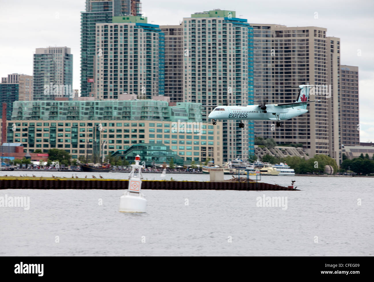 Air Canada airplane arriving to Toronto Island Airport Stock Photo
