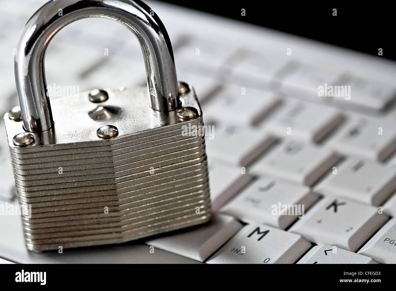 locked padlock on computer keyboard Stock Photo