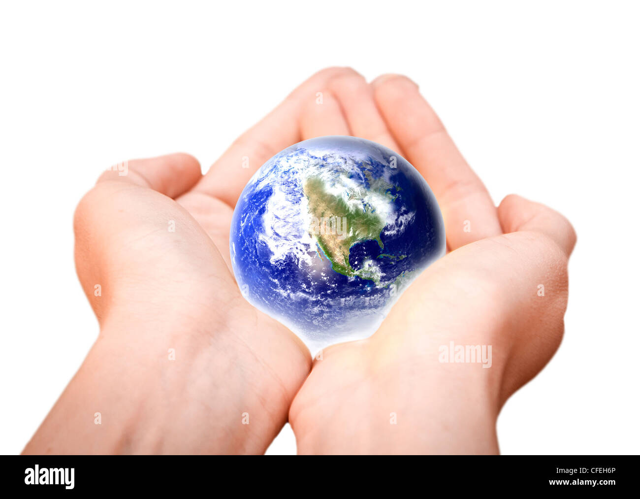human hands carefully holding Earth planet. Glass World Stock Photo
