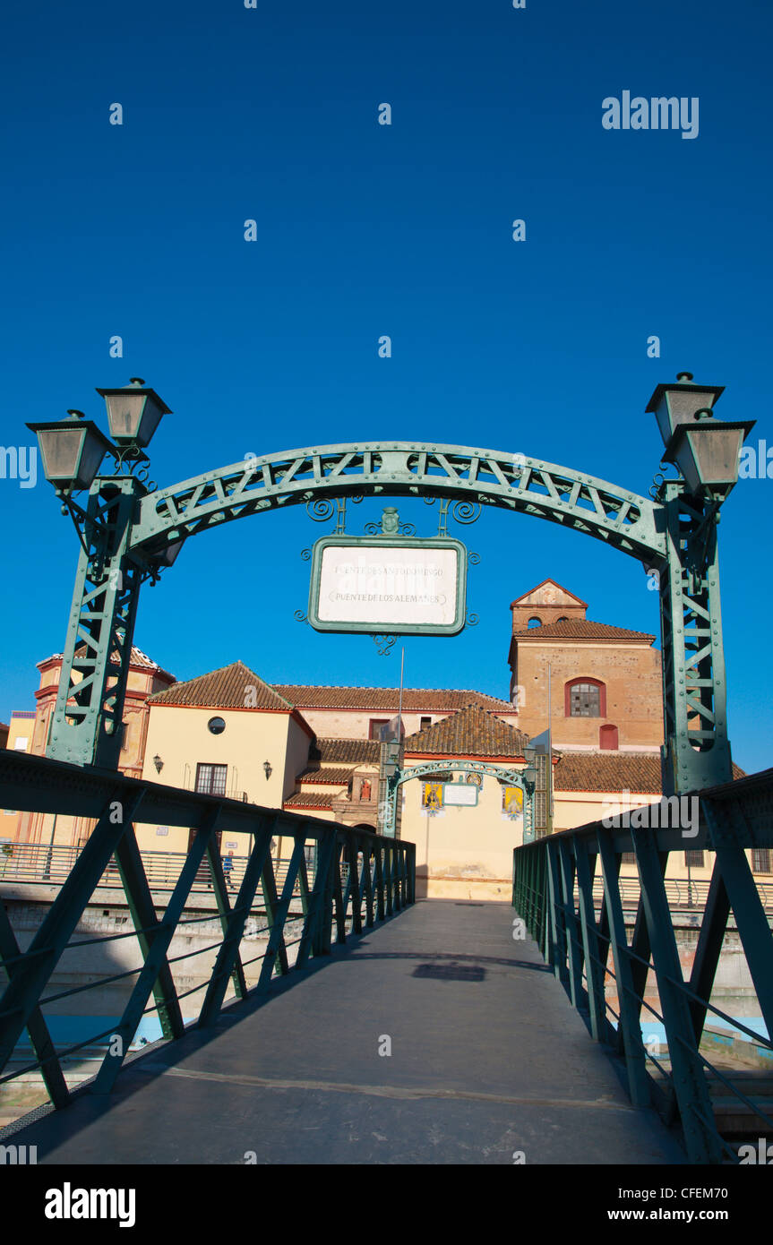 Puente de Santo Domingo aka Puente de los Alemanes bridge donated by Germany in 1909 crossing Rio Guadalmedina river Stock Photo