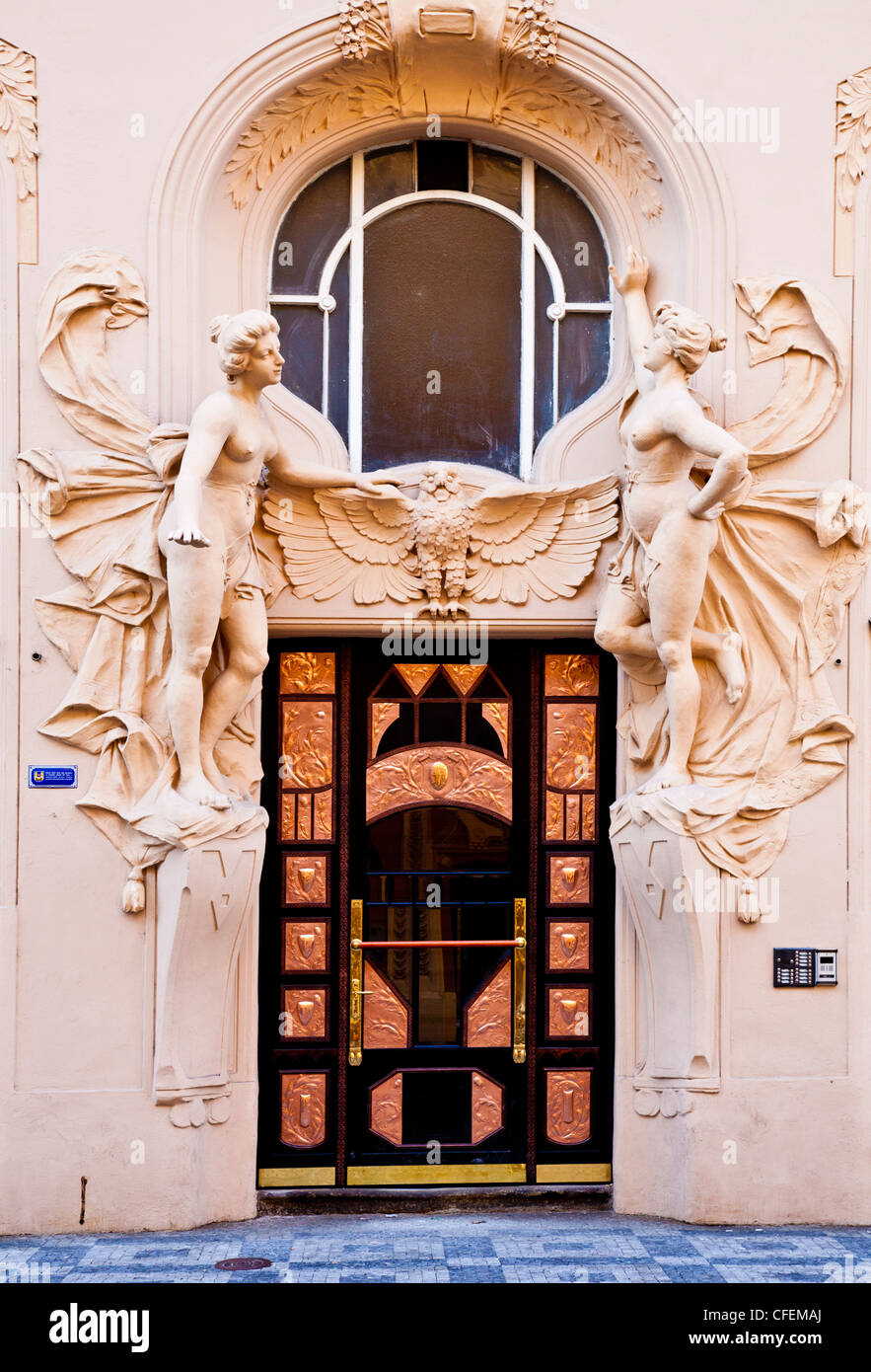 Two female sculptures over a door in the Old Town of Prague, Czech Republic Stock Photo