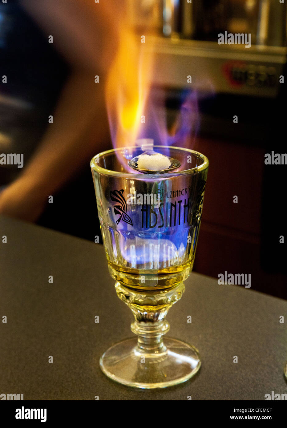 Absinth undergoing the fire ritual in an Absintherie in Prague, Czech Republic Stock Photo