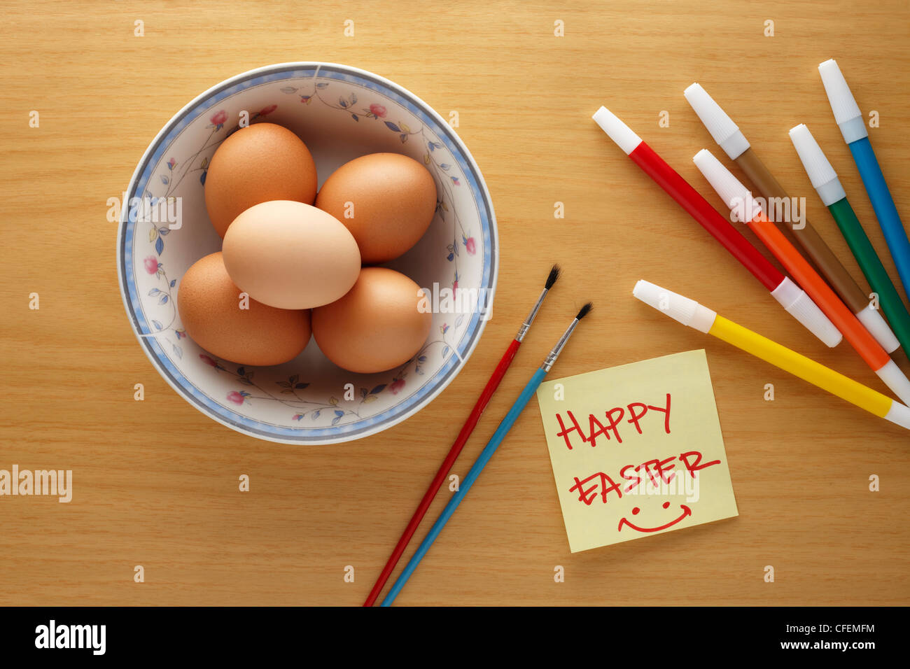 preparation to decorate easter eggs with markers and brushes Stock