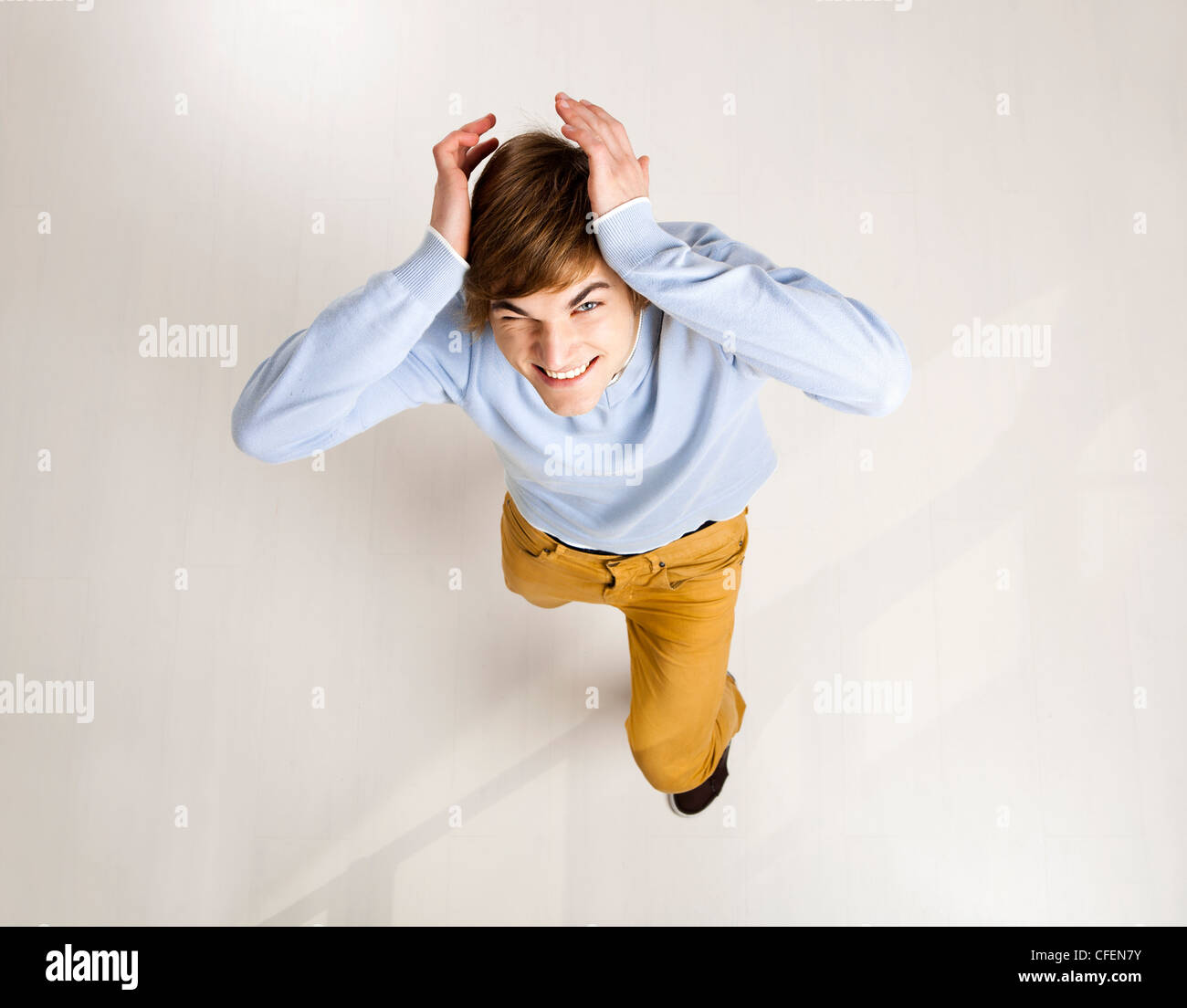 Funny portrait of a stressed young man Stock Photo