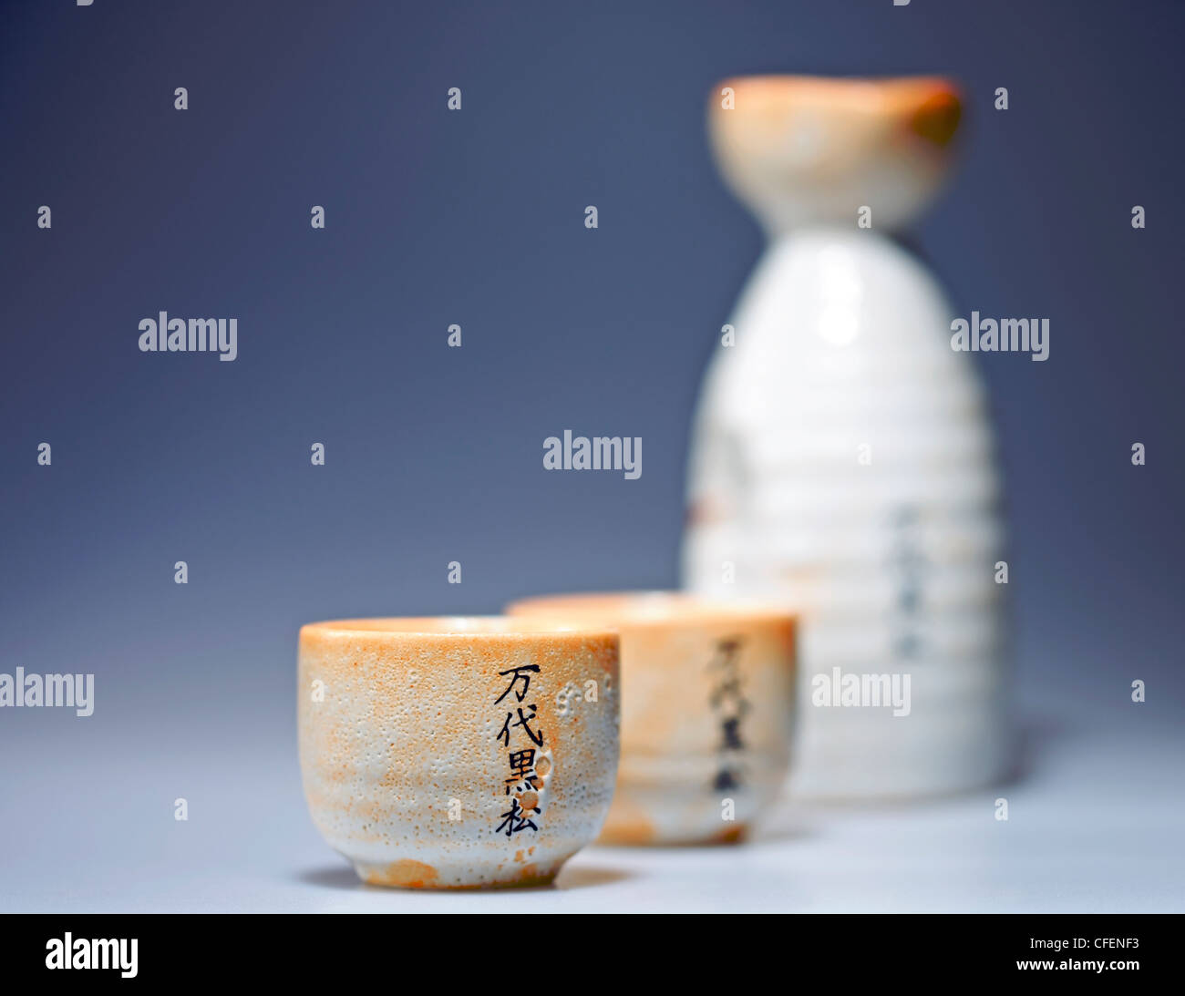 Japanese sake cups and bottle Stock Photo Alamy