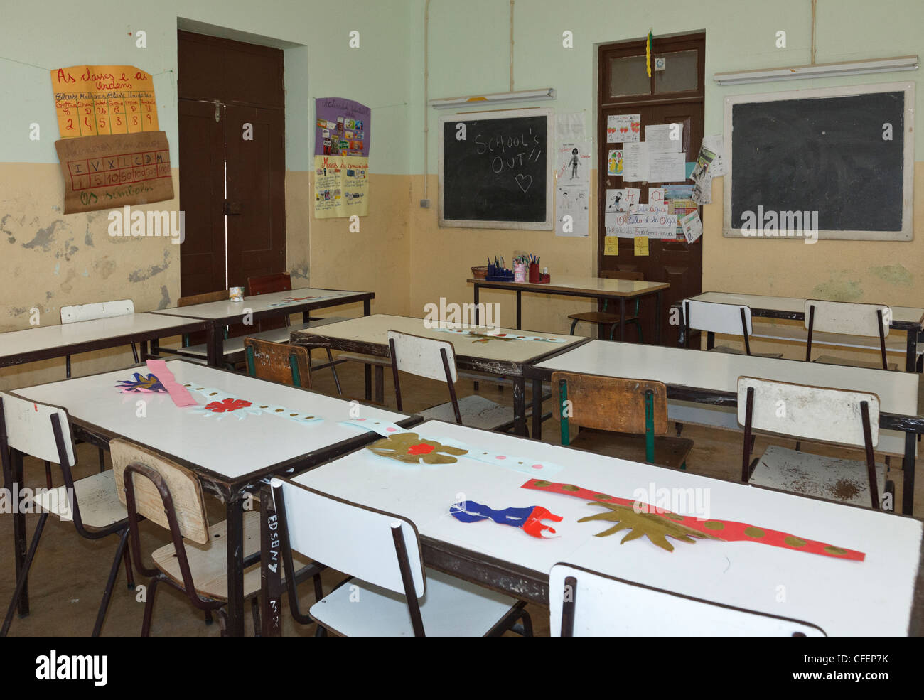Empty desks and blackboards inside the sparsely furnished primary school classroom in Sal Rei, Boa Vista, Cape Verde Islands. Stock Photo