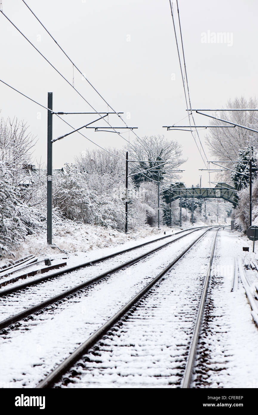 Railway track covered in snow, Acton Central, London, United Kingdom Stock Photo