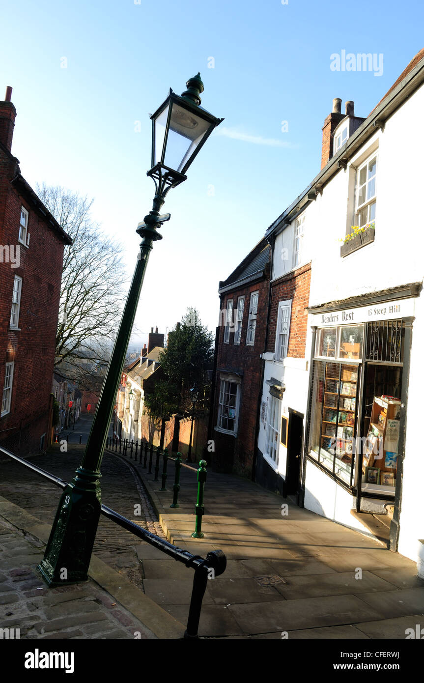 Steep Hill Lincoln.Lamppost Leaning (do not adjust your set). Stock Photo