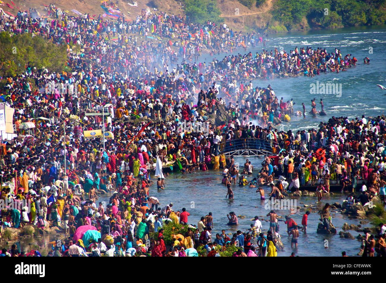 Thousands of People Crowding the Marble Falls on a Holy Day in India Stock Photo