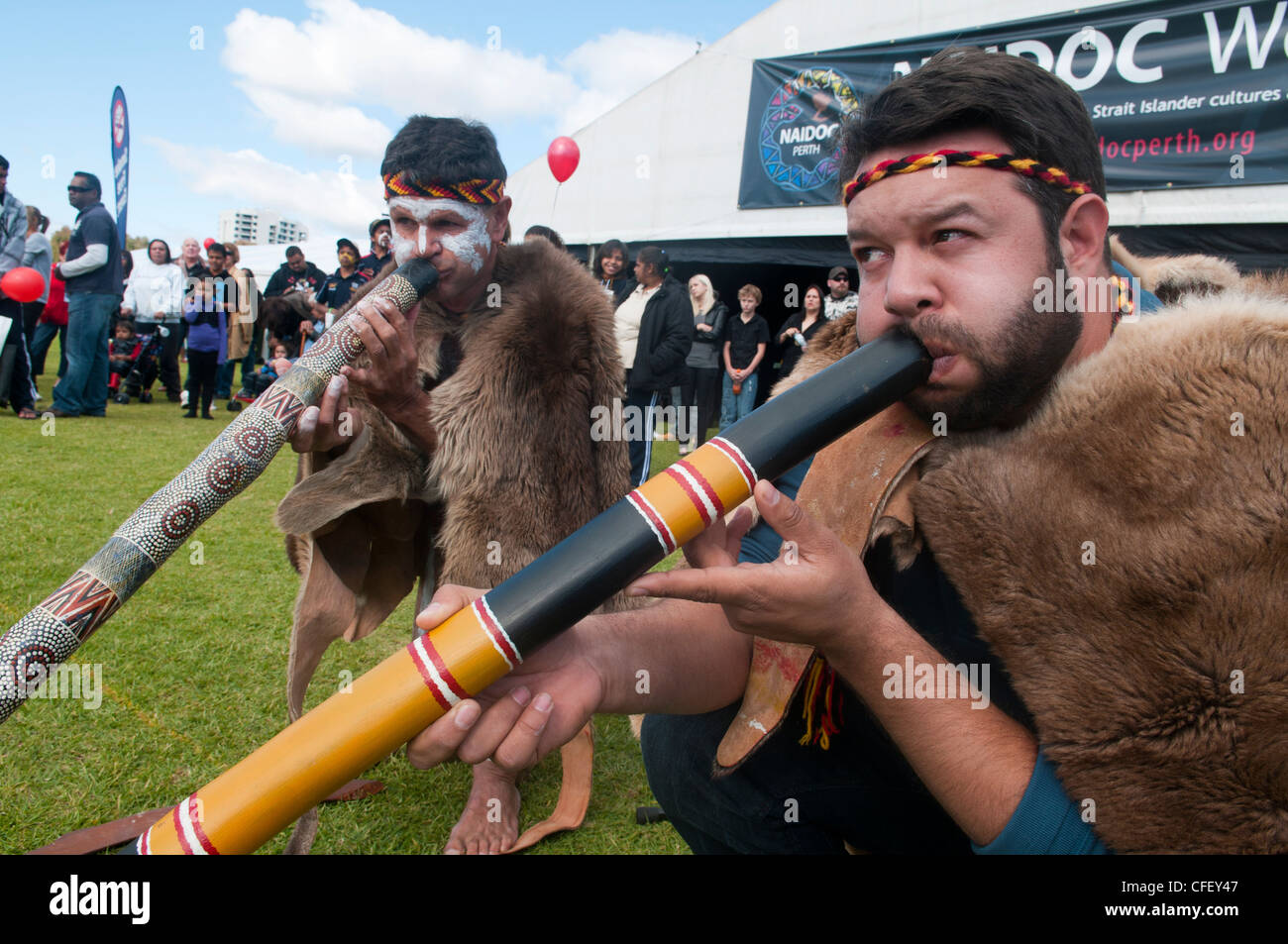 Noongar men with didgeridoos in Perth, Australia Stock Photo