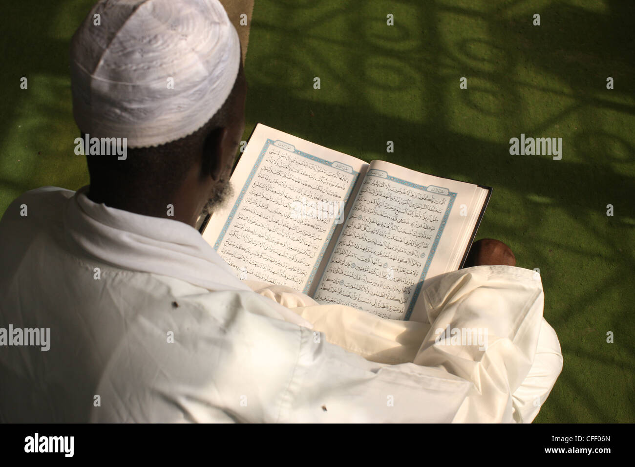 Imam reading the Koran, Brazzaville, Congo, Africa Stock Photo