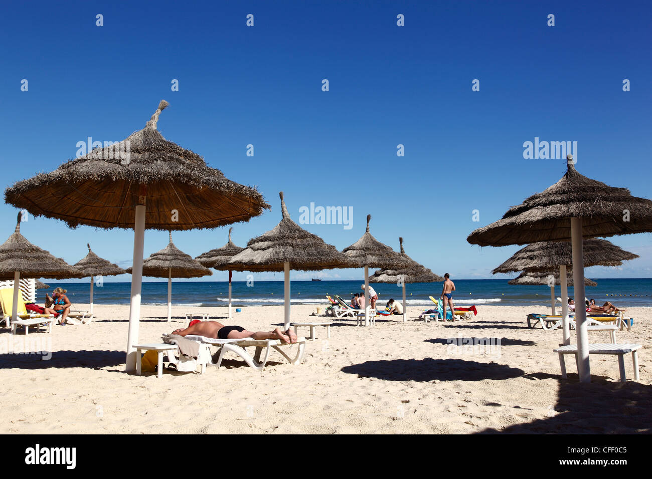 Beach scene in the tourist zone of Sousse, Gulf of Hammamet, Tunisia, North Africa, Africa Stock Photo