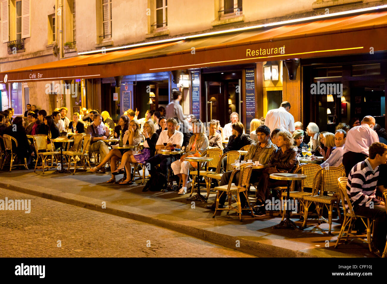 Cafe scene at night, Paris, France, Europe Stock Photo