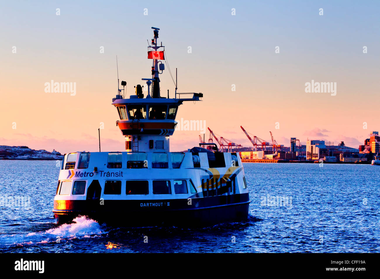 Passenger ferry crossing Halifax Harbour at Dawn, Halifax, Nova Scotia, Canada Stock Photo