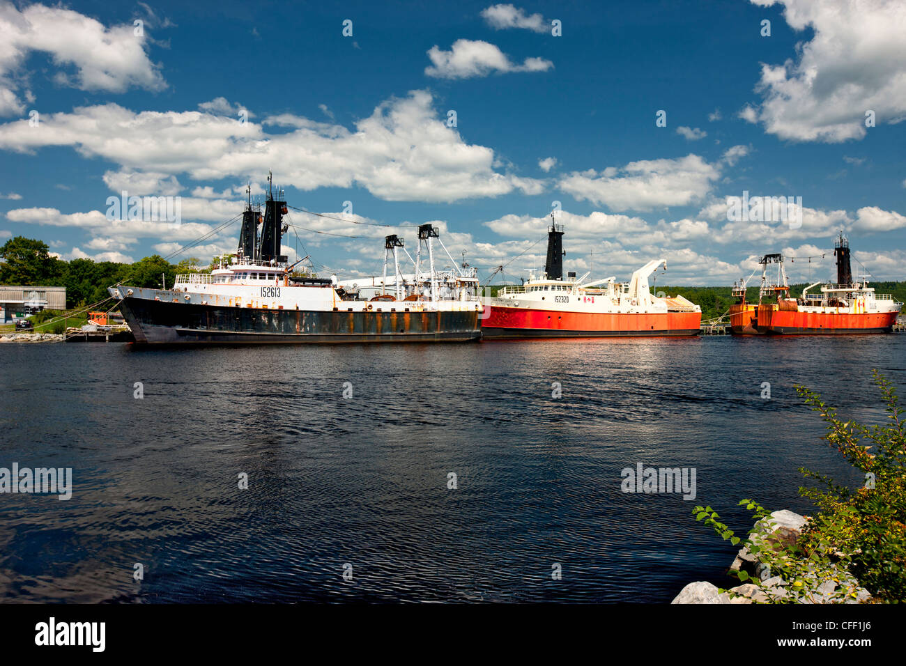 Ships tied up at wharf, Liverpool, Nova Scotia, Canada Stock Photo