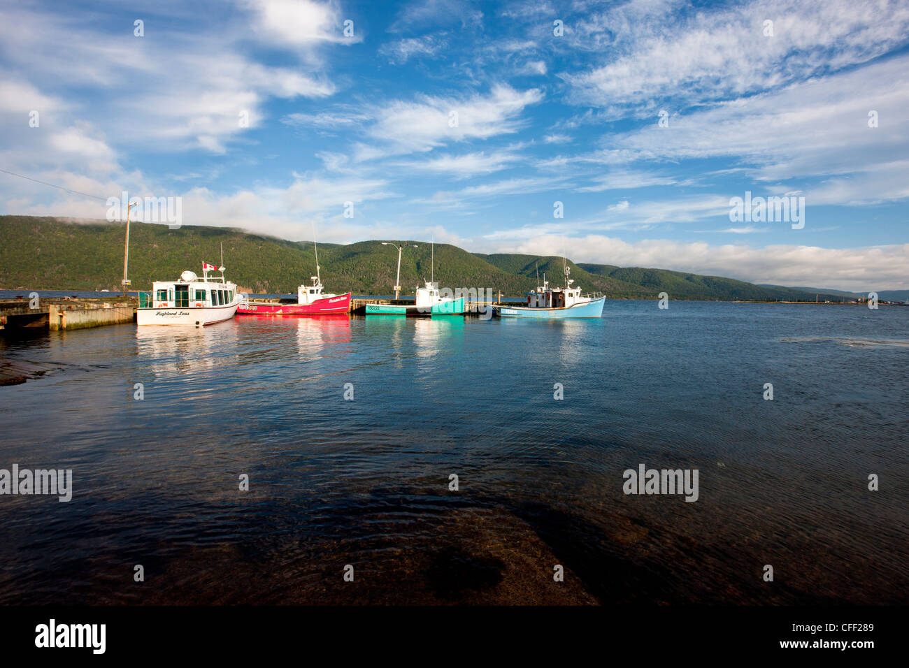 Multi coloured multi colored fishing boats hi-res stock photography and ...
