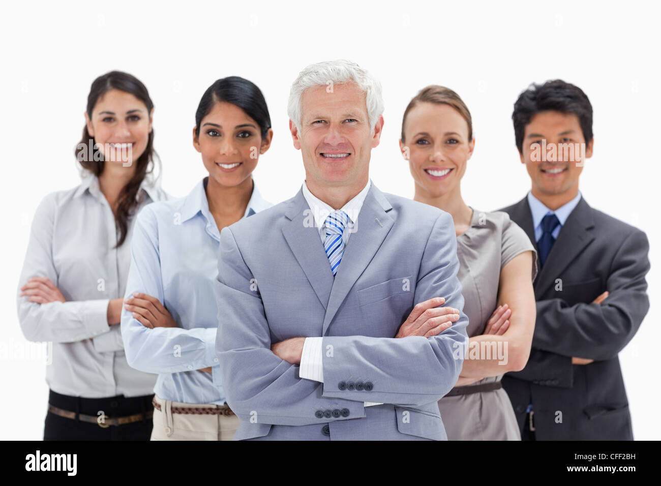 Diverse close business team smiling in the office Stock Photo - Alamy